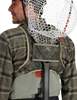 Simms Tributary Hybrid Chest Pack has a built in fly fishing net holder.