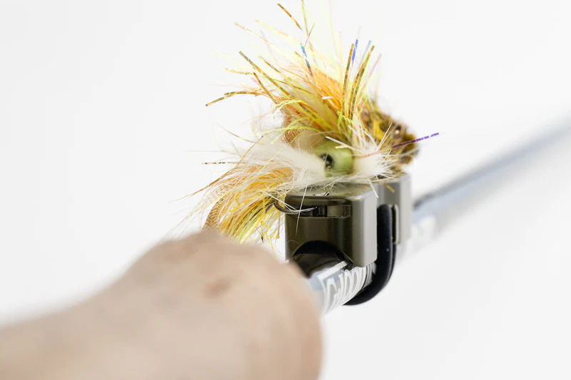 Close up view of the hook keeper feature of the Cling Mag Grab Rod Rack