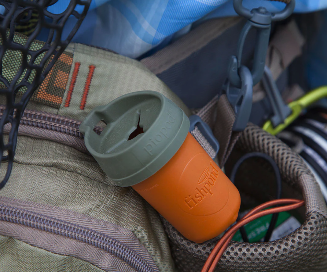 Fishpond PIOPOD Microtrash Container For Sale Online Cutthroat Orange Action