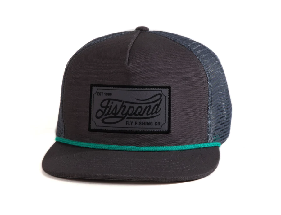 Fishpond Heritage Trucker Hat with embroidered logo and mesh back for airflow, order today while supplies last.