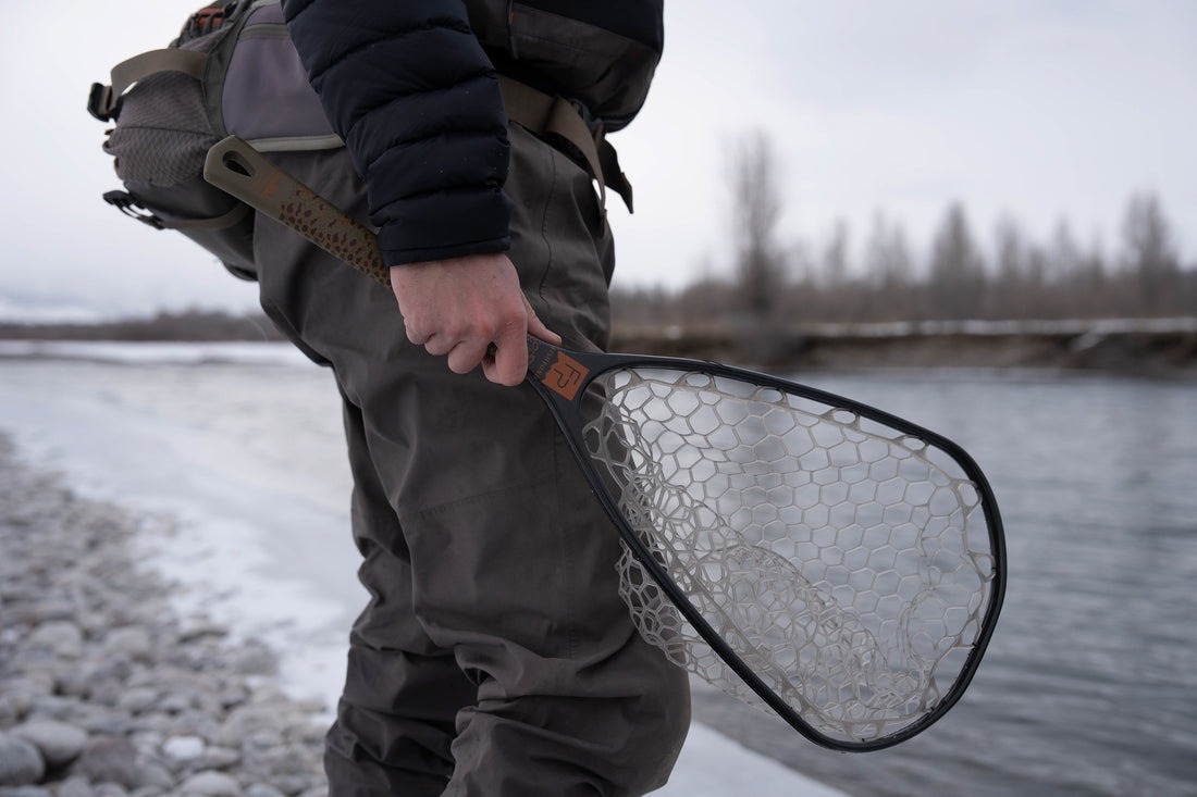 Lightweight floating Fishpond trout net carried during walk-wade fishing