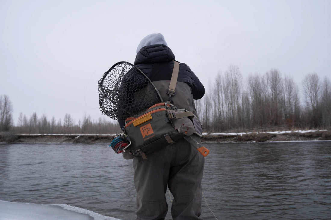 Fishpond Nomad Emerger 2.0 fly fishing landing net carried on sling pack system