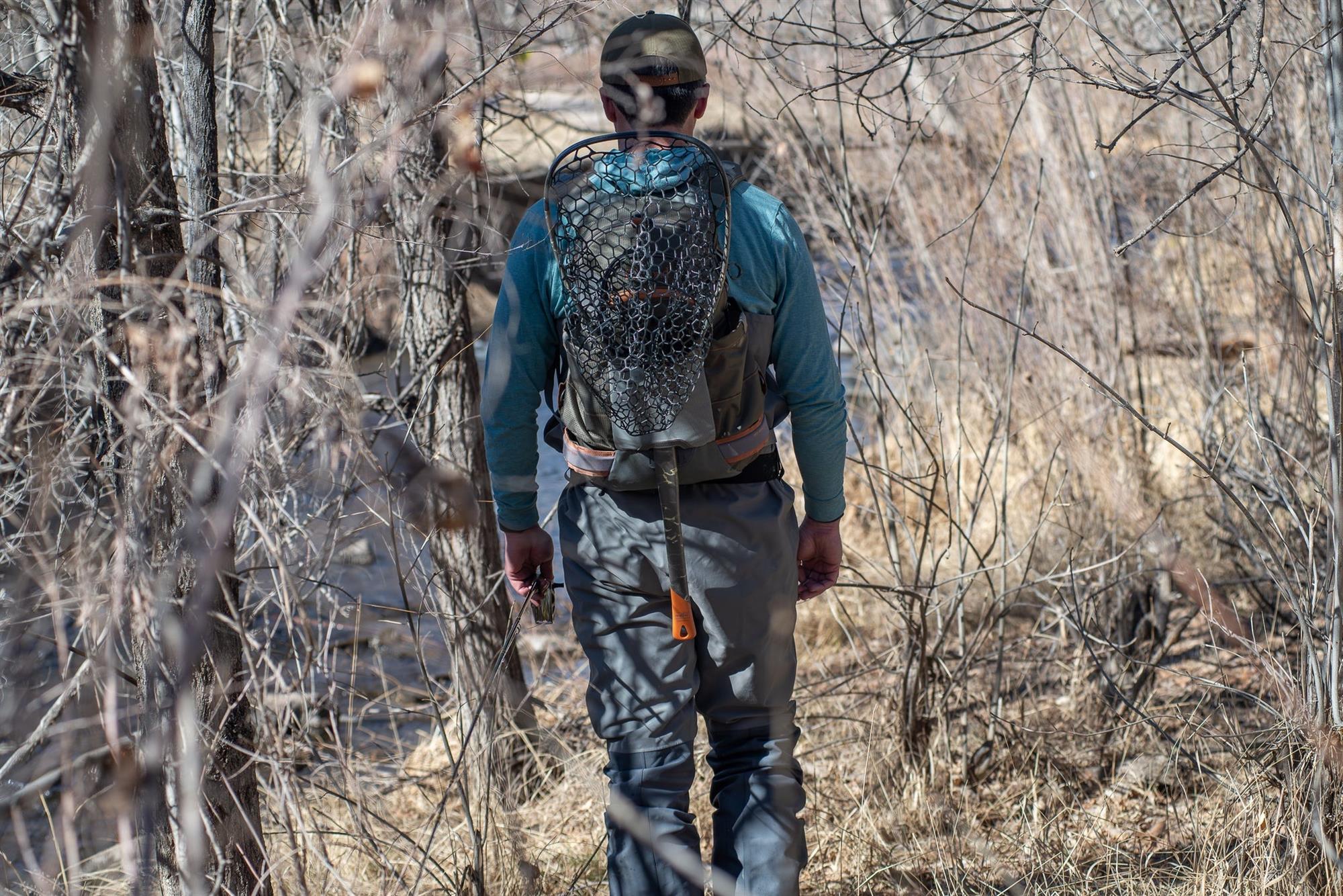 Fishpond Nomad Middle Fork 2.0 net carried in backpack net sleeve for walk-and-wade fly fishing