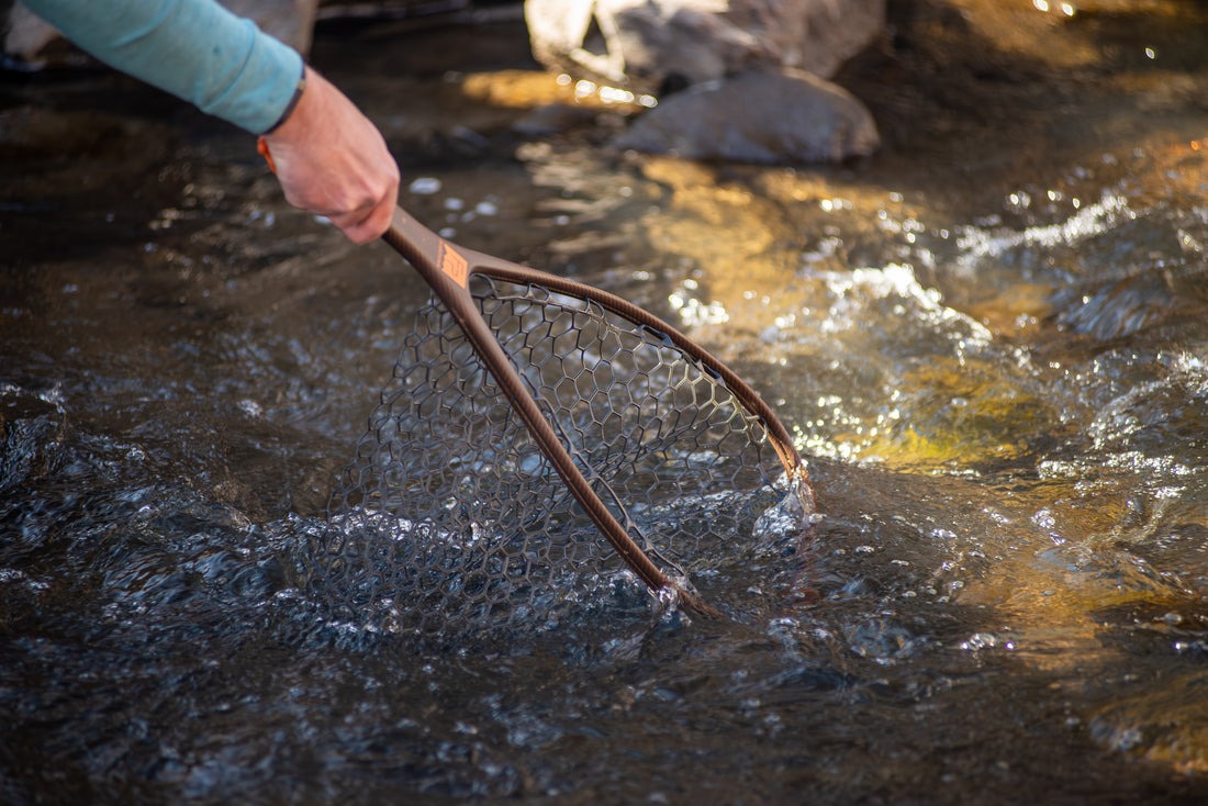 Kevlar reinforced Fishpond fly fishing landing net in rocky river environment