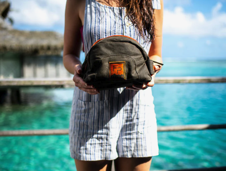 Travel-friendly Fishpond toiletry bag with durable, classic design and grab handle