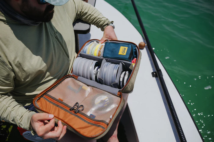 Fly fishing reel case with sturdy nylon Cyclepond fabric – Fishpond Honcho Reel Case