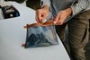 Keep your essential items safe and water proof while on the boat with the Fishpond Sandbar Travel Pouches