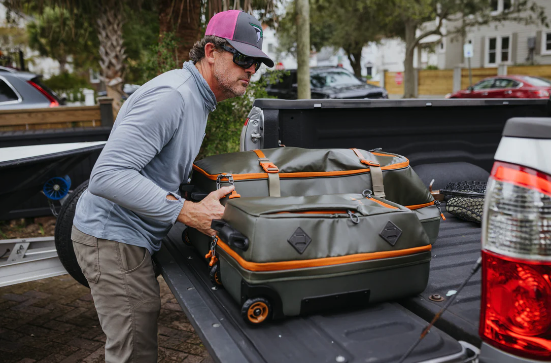 Fishpond Stormshadow Rolling Carry-On with reinforced zippers and water-resistant material for secure travel