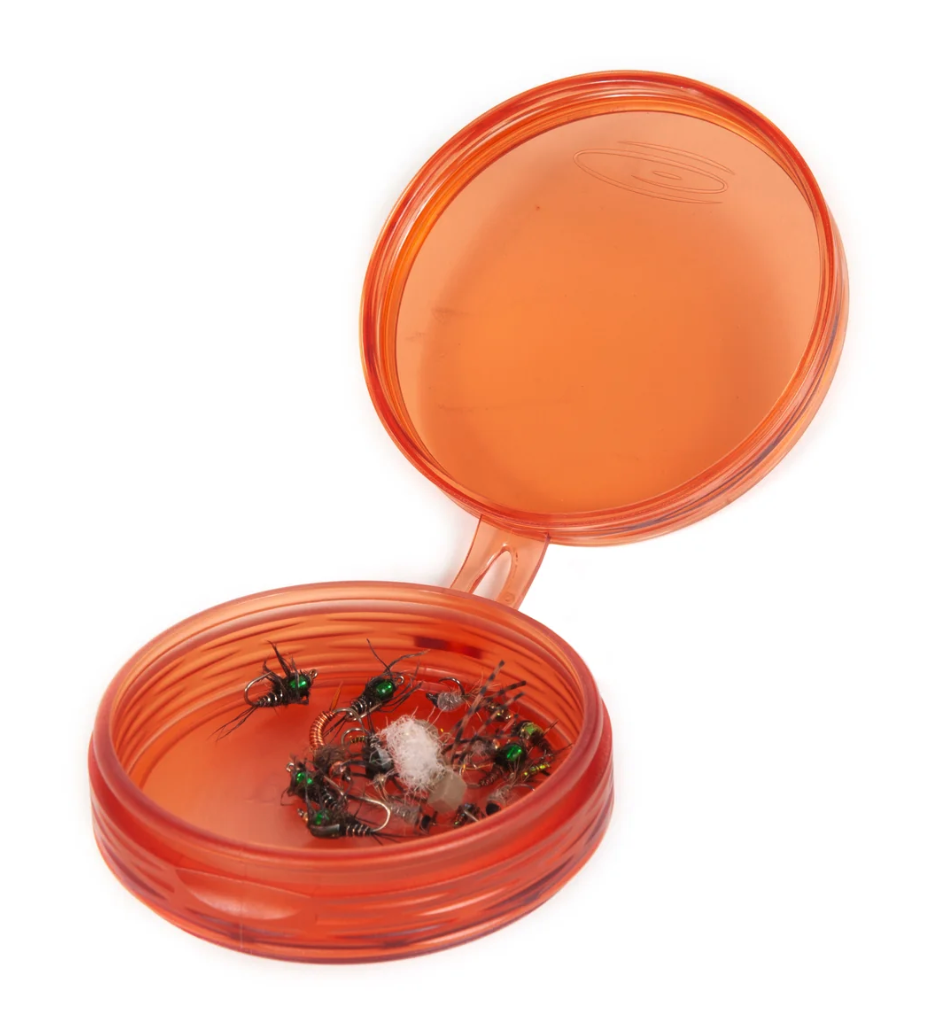 Fishpond Tacky Shallow Fly Puck is a compact fishing fly storage solution.