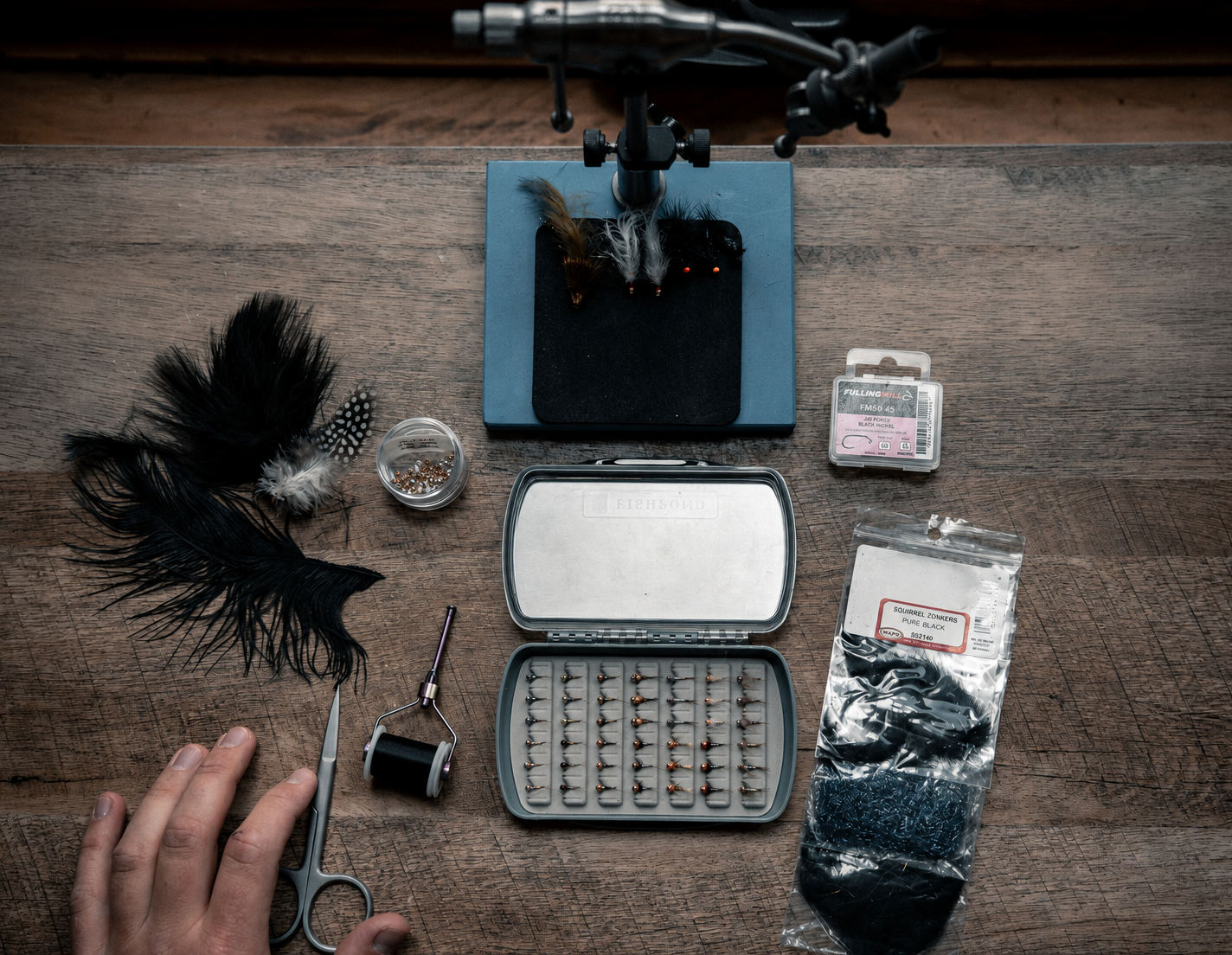 Fishpond Tacky Pescador LowPro Clear Small Fly Box filled on fly tying desk