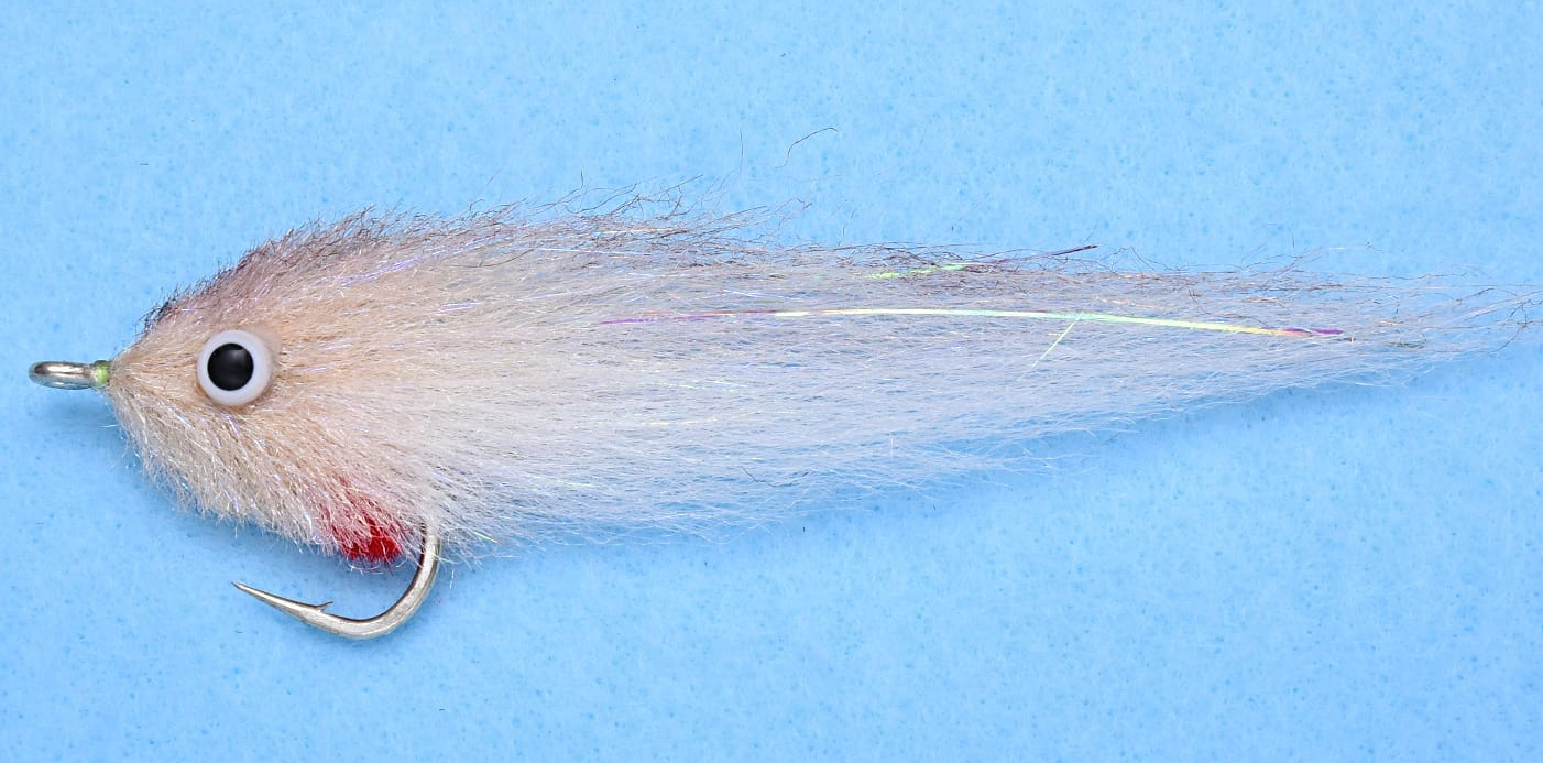 Saltwater fly fishing with EP GT Baitfish fly, effective for giant trevally and aggressive species.