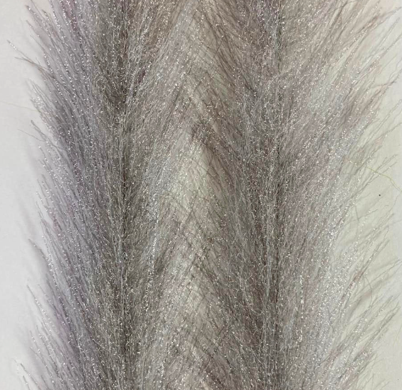 This fly tying brush makes lifelike tarpon streamers to use on your next saltwater trip