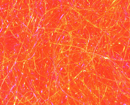 Rich eat a peach orange Fusion Dubbing by Senyo, perfect for tying attention-grabbing saltwater flies.