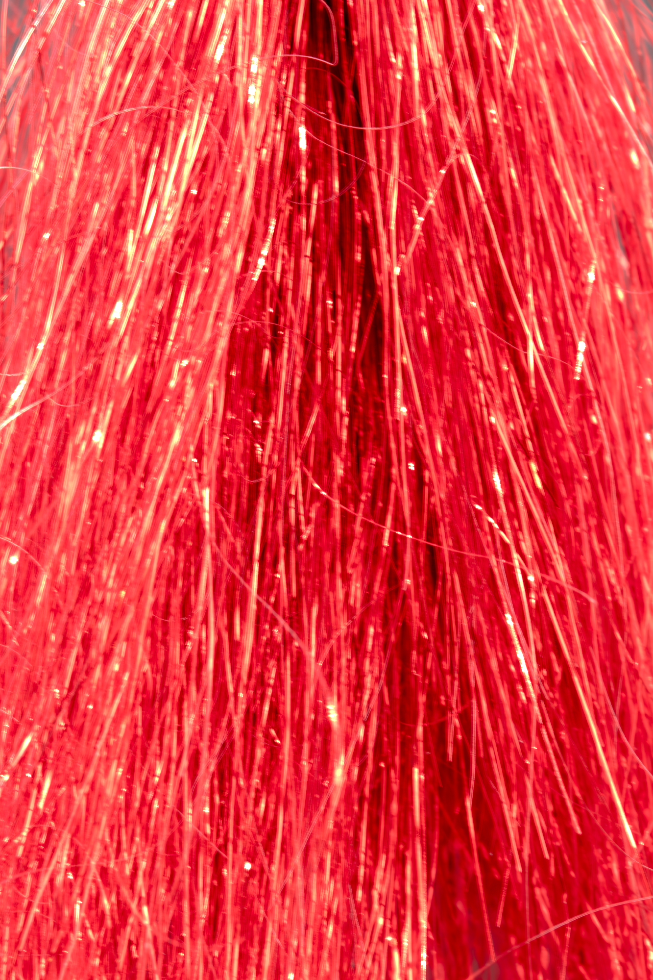 Red colored hank of Shiner Fibers