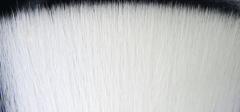 Revolutionize your fly tying with the innovative Faux Bucktail material.
