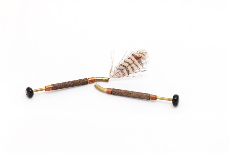 Rotary hackle plier for palmering feathers and fibers