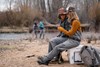 Lightweight and packable rain jacket for outdoor adventures.