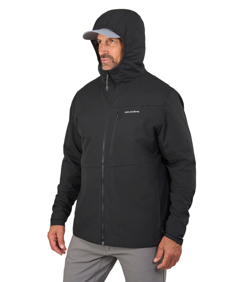Model wearing Grundens Turbulence Hybrid Hoodie with hood up