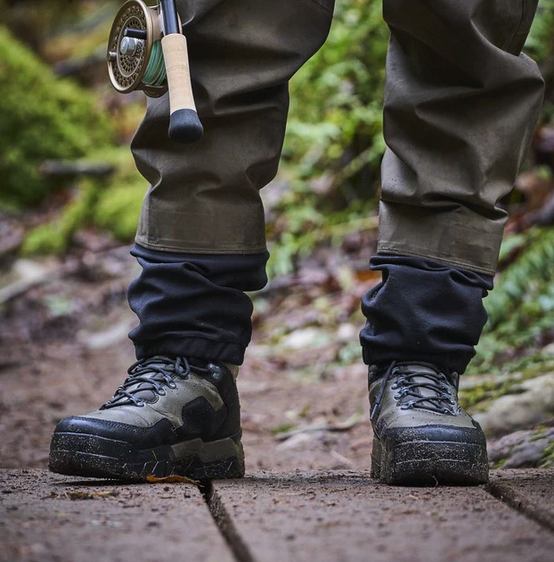 High-performance Grundens Boundary Waders with integrated D-Ring net holder for easy access