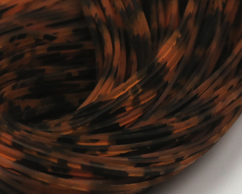 Hareline Barred & Speckled Crazy Legs for fly tying are a great way to add color and movement when tying flies for bass, trout,