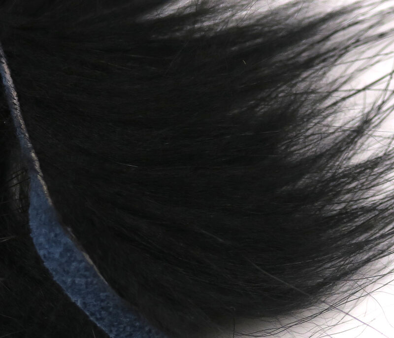 Black Fin Raccoon Zonker strip, soft and glossy, ideal for fly tying streamers with lifelike movement.