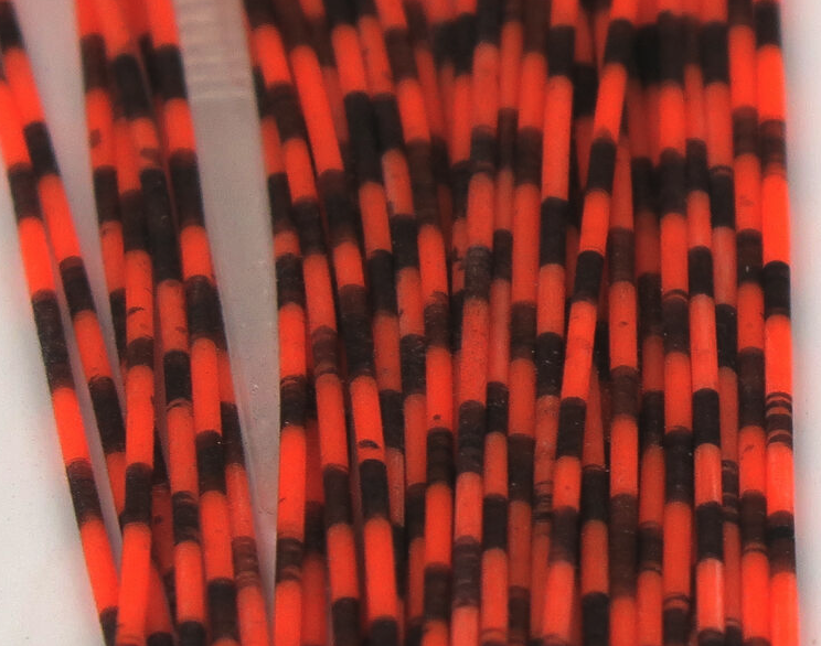 Grizzly Barred Round Rubber Barred Legs Medium Are A Go To Fly Tying Material For Adding  A Lateral Line To Flies For Predators