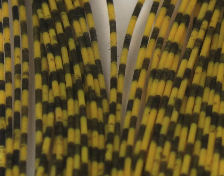 Grizzly Barred Round Rubber Barred Legs Medium Are A Go To Fly Tying Material For Adding  A Lateral Line To Flies For Predators