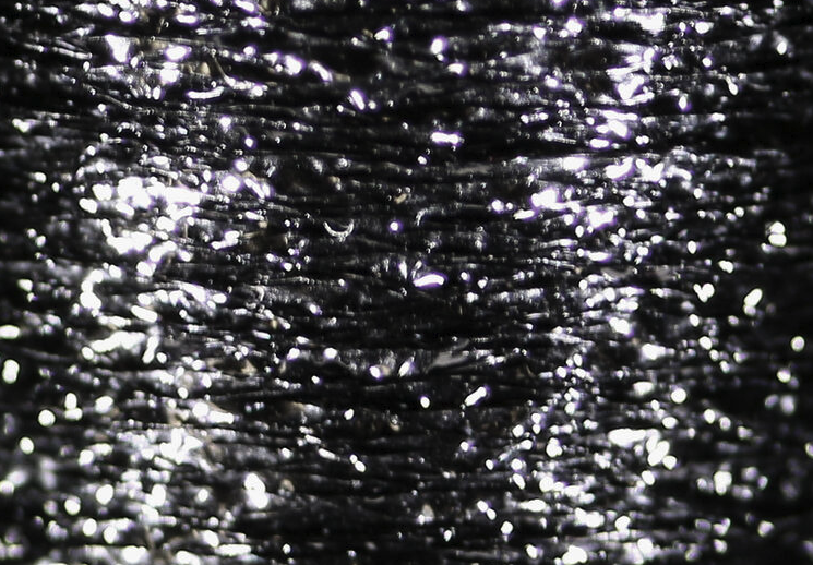 Veevus Body Quill in black, adding a flair of creativity to traditional fly tying