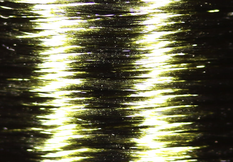 Glossy Veevus Floss in olive, enhancing the realism of nymph and wet fly patterns