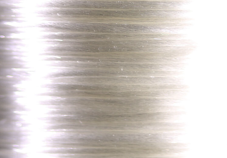 Silky smooth Veevus Floss in white, versatile for both traditional and modern fly patterns