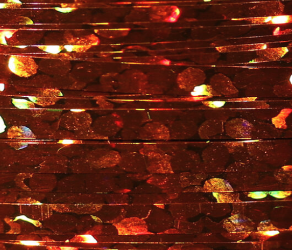 Orange Veevus Holographic Tinsel, effective for crafting visible and appealing fly patterns