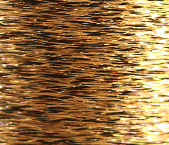 Old gold Veevus Mini Flat Braid, classic for tying traditional patterns with a rich appearance.
