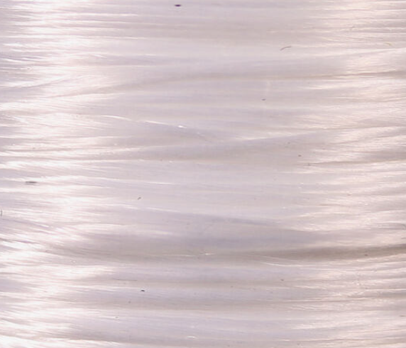 White Veevus 240 Power Thread, essential for tying bright and enticing flies for pike, musky, and saltwater fishing