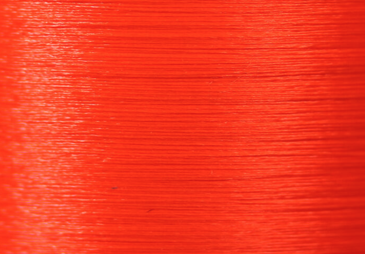 Veevus 6/0 thread in orange, excellent for tying vibrant salmon and steelhead streamers