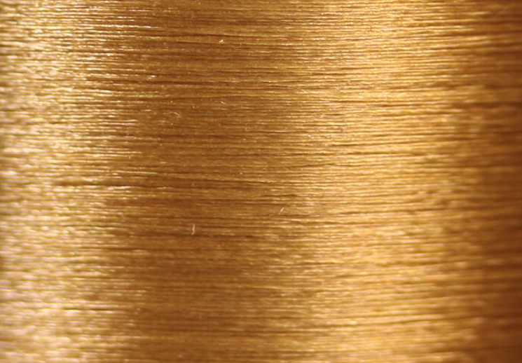 Tan Veevus 14/0 thread, ideal for replicating natural nymph and dry fly bodies