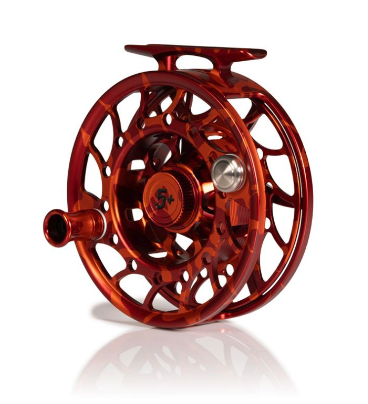 Angled view of Mid Arbor Hatch Iconic Fly Reel 5 Plus Magma Limited Edition