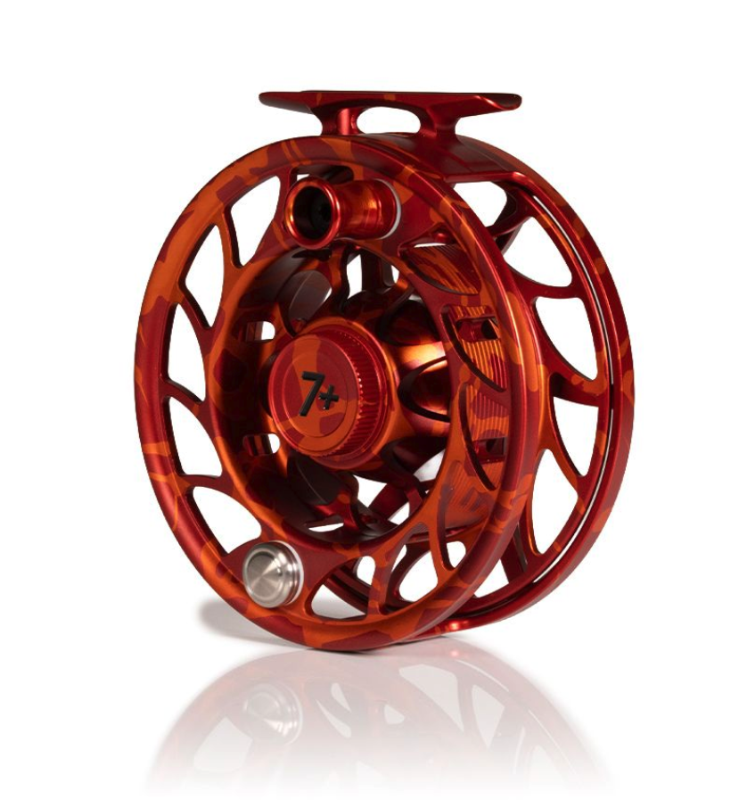 Angled view of Large Arbor Hatch Iconic Fly Reel 7 Plus Magma Red Orange Limited Edition