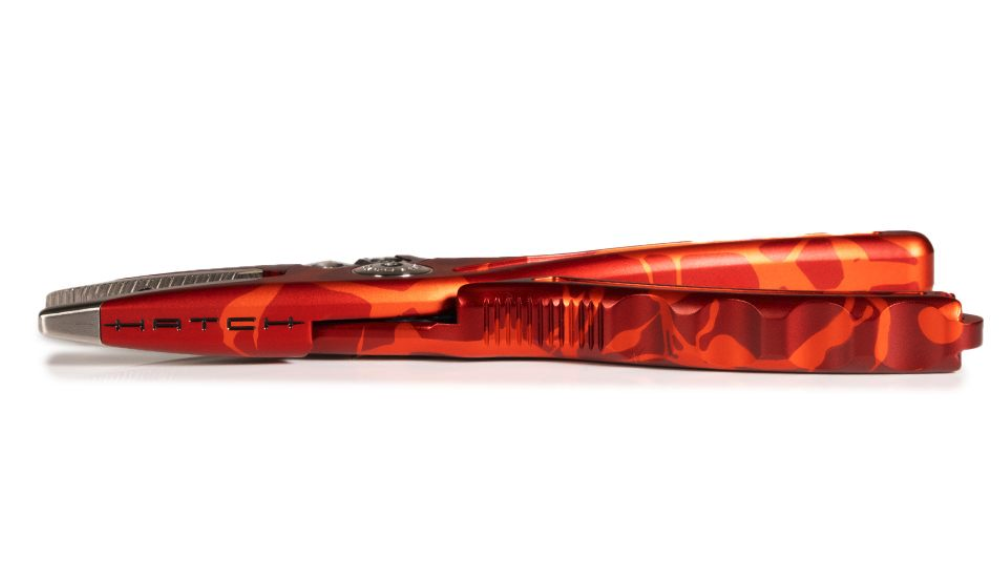 Hatch Nomad 2 Pliers Magma Limited Edition laying on side