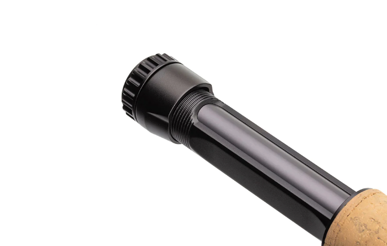 Lamson Guru in action on a serene river, demonstrating its smooth action and sensitivity for trout fishing.