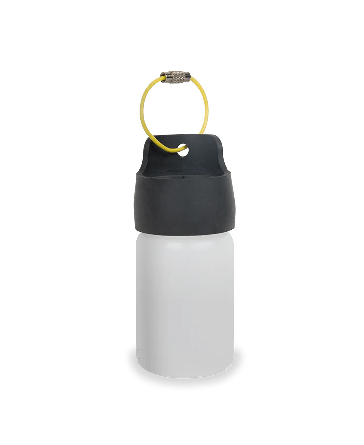 Loon Trash Topper attached to 2 oz Loon bottle trash container