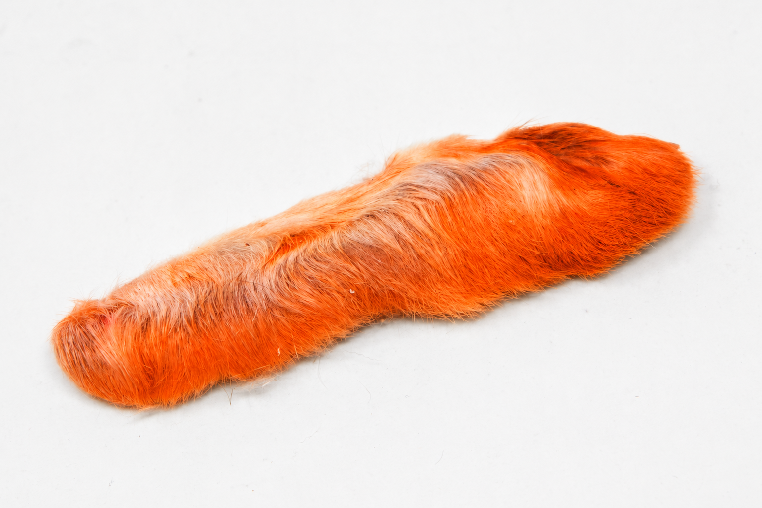 Nature's Spirit Snowshoe Rabbit Foot in the color hot orange