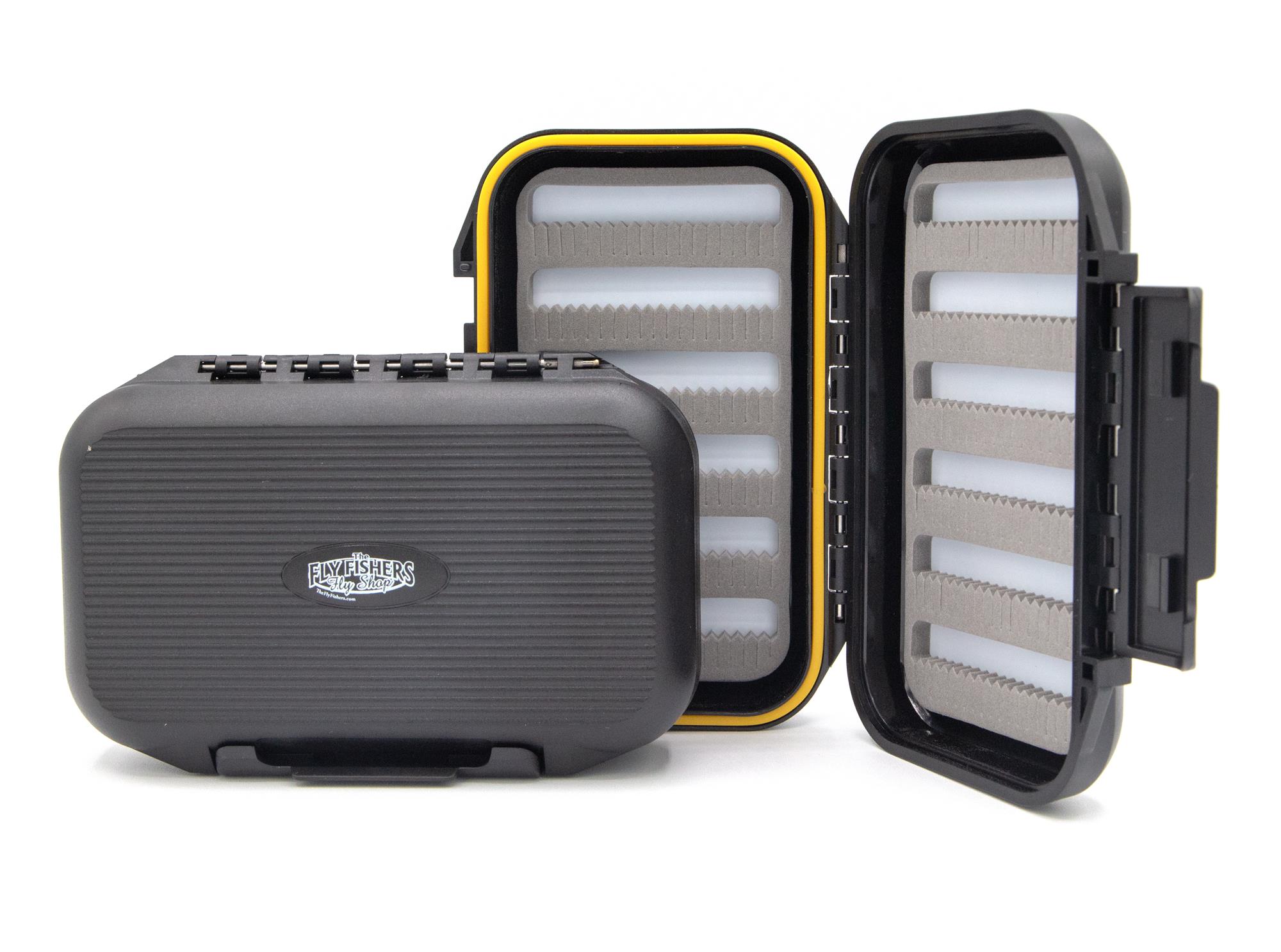 An open small Fly Fishers Waterproof Go To Fly Box standing next to a closed version