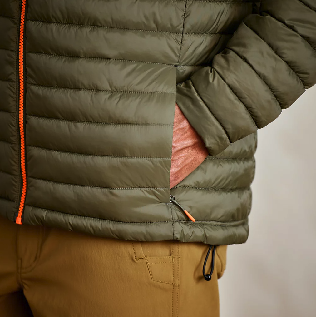 Hand in pocket detail of Orvis Drift Insulated Jacket Tarragon color