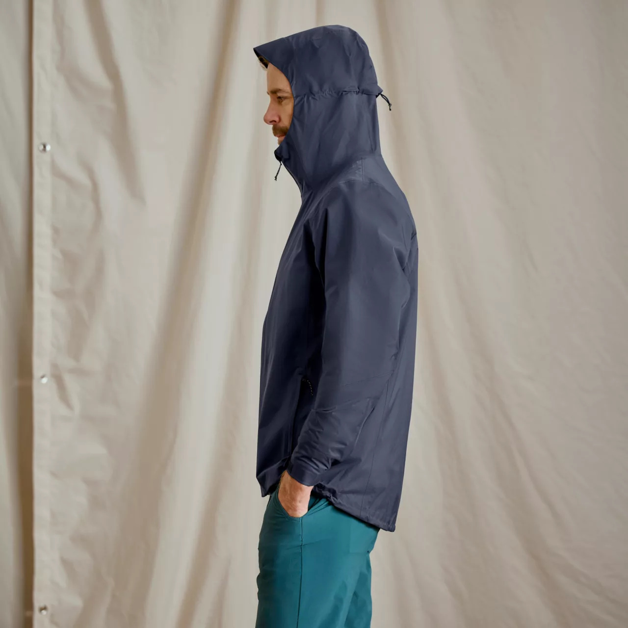 Side profile view of the Orvis Men's Ultralight Storm 2.5L Jacket