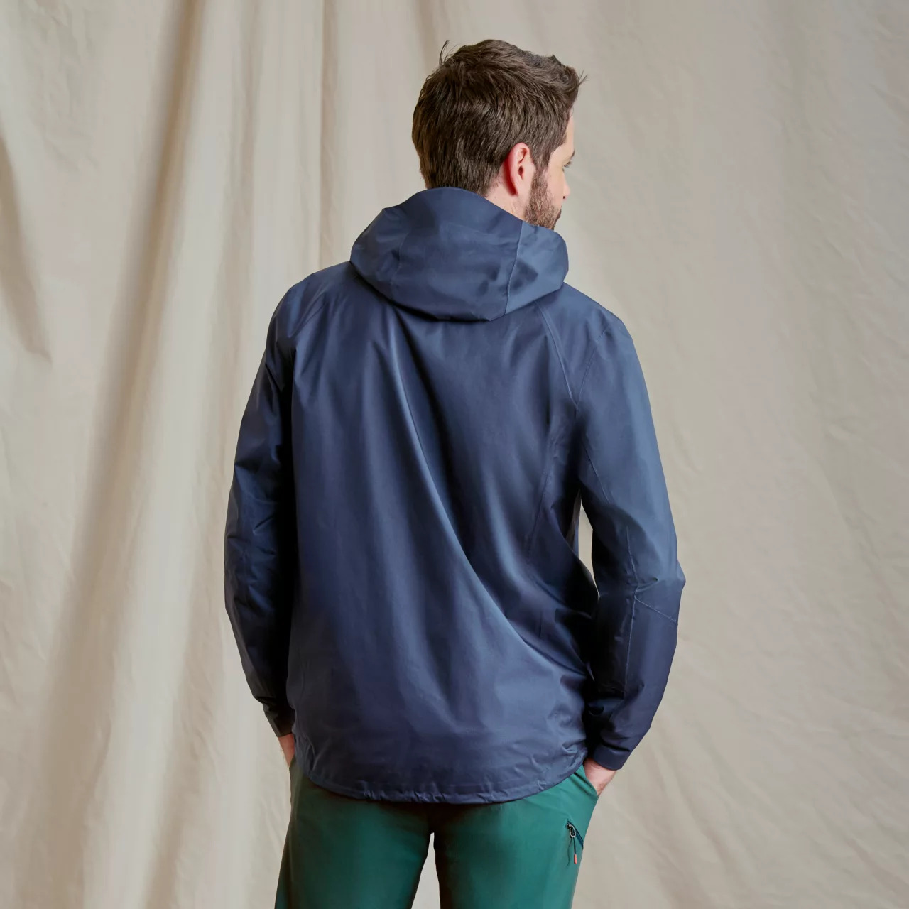 Backside view of the Orvis Men's Ultralight Storm 2.5L Jacket
