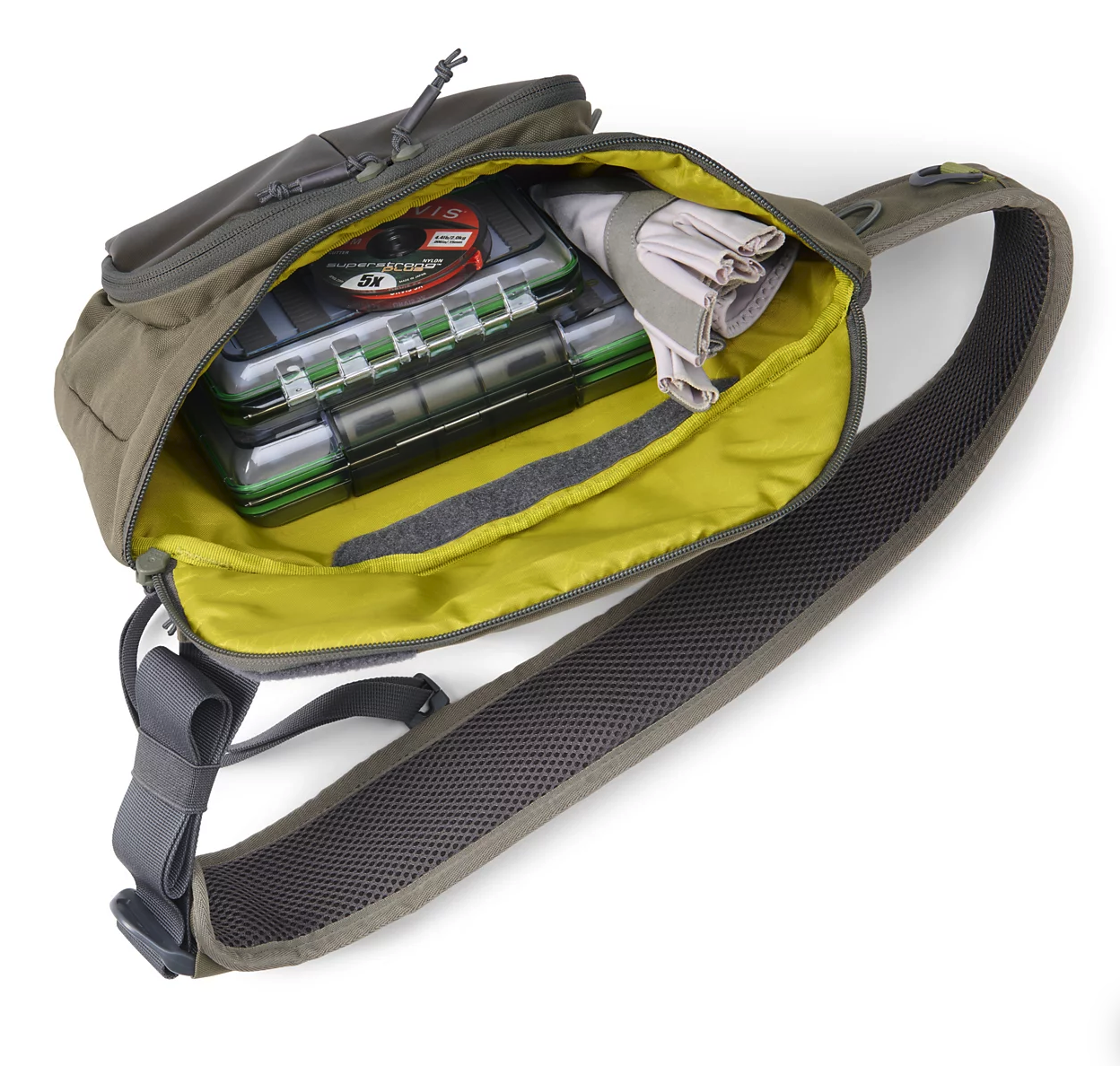 Orvis Mini Sling Pack Dusty Olive open with fly boxes inside