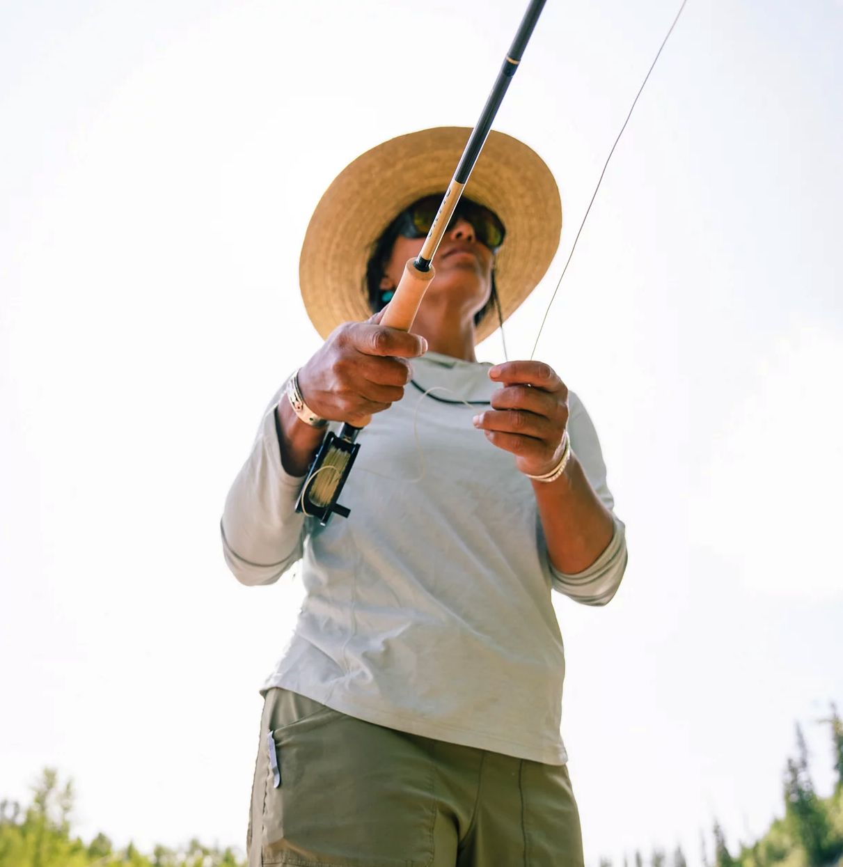 Fly angler fishing with Orvis Helios D Limited Edition 50th Anniversary Fly Rod