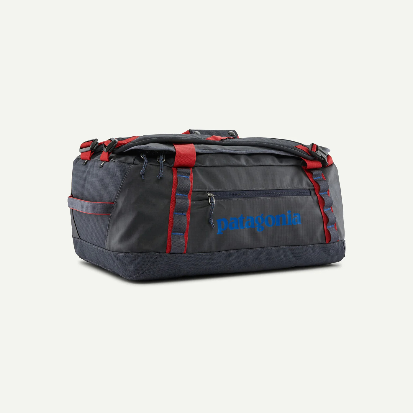 Patagonia Black Hole Duffel 40L in dark gray with red straps for fishing trips, camping weekends, and carry-on travel