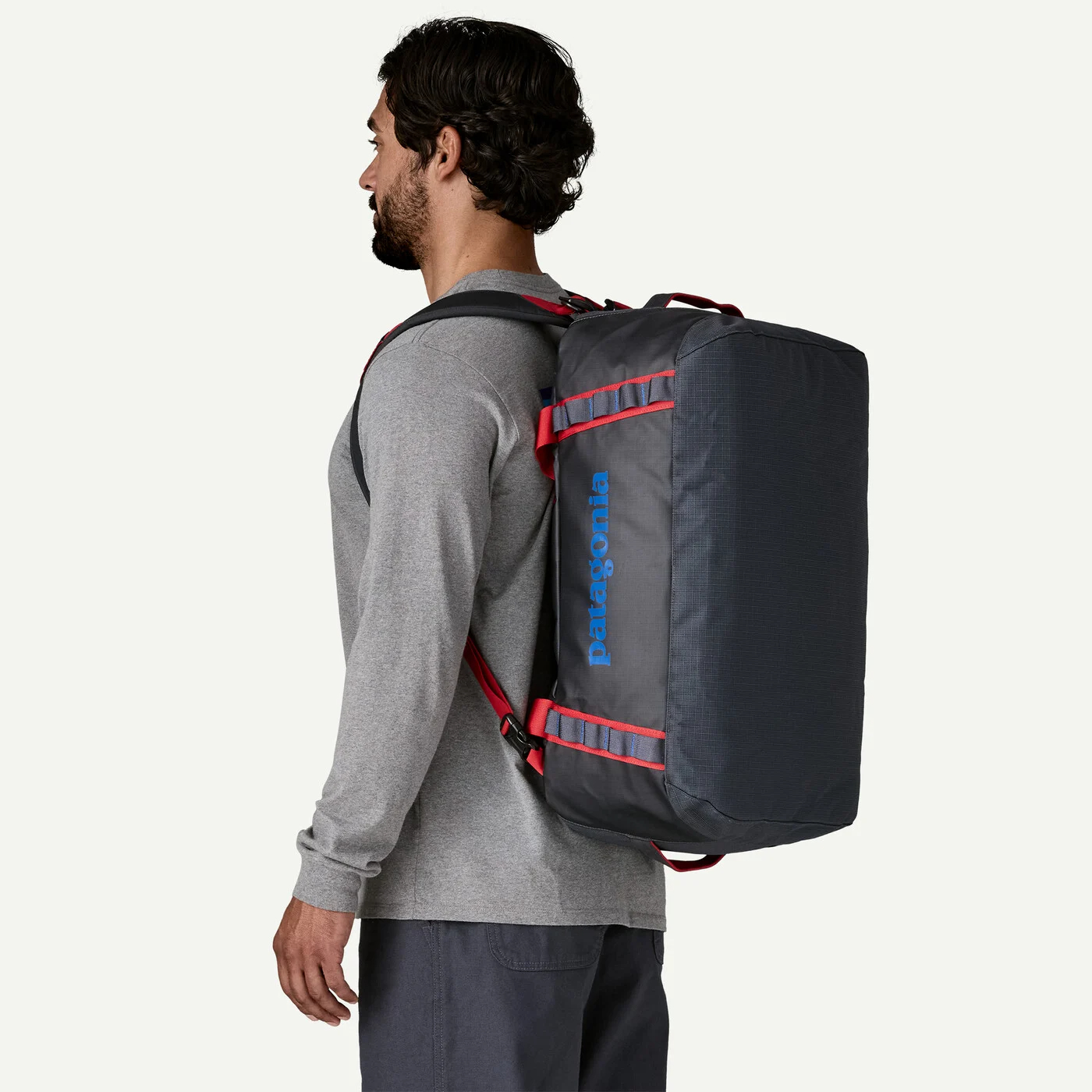 Patagonia Black Hole Duffel 40L worn as a backpack with removable padded straps for hands-free travel