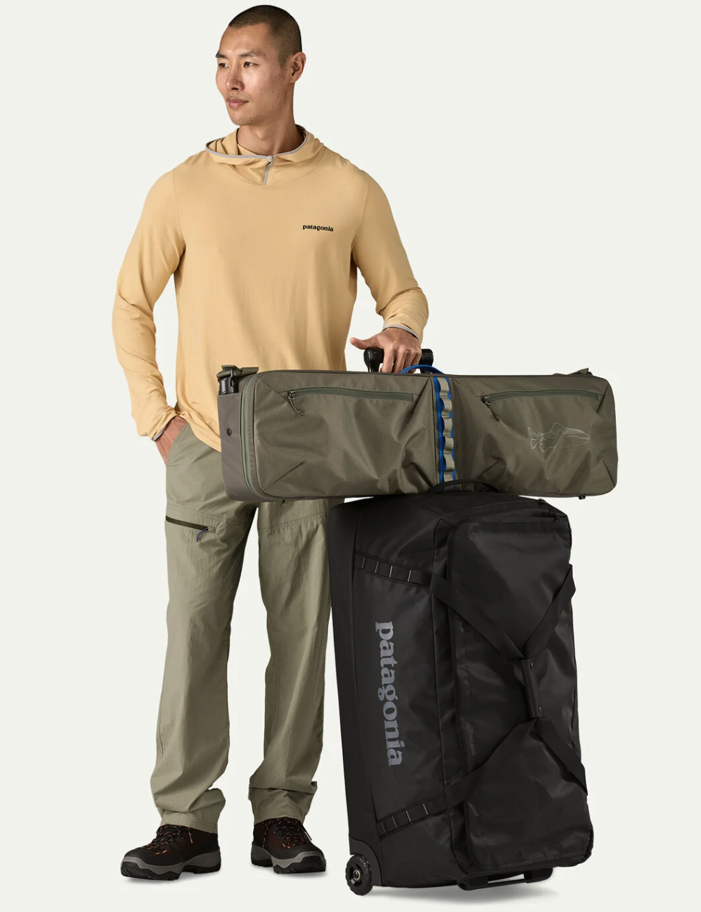 Patagonia Black Hole Rod Case on roller bag